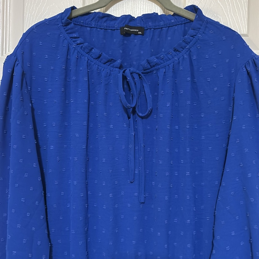 Blue dress with pleated skirt